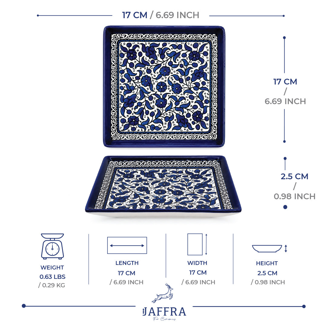 handcrafted square plate with elegant cobalt blue floral pattern.