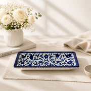 handcrafted square plate with elegant cobalt blue floral pattern.
