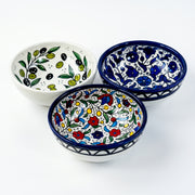 Hand-painted ceramic shown in three patterns