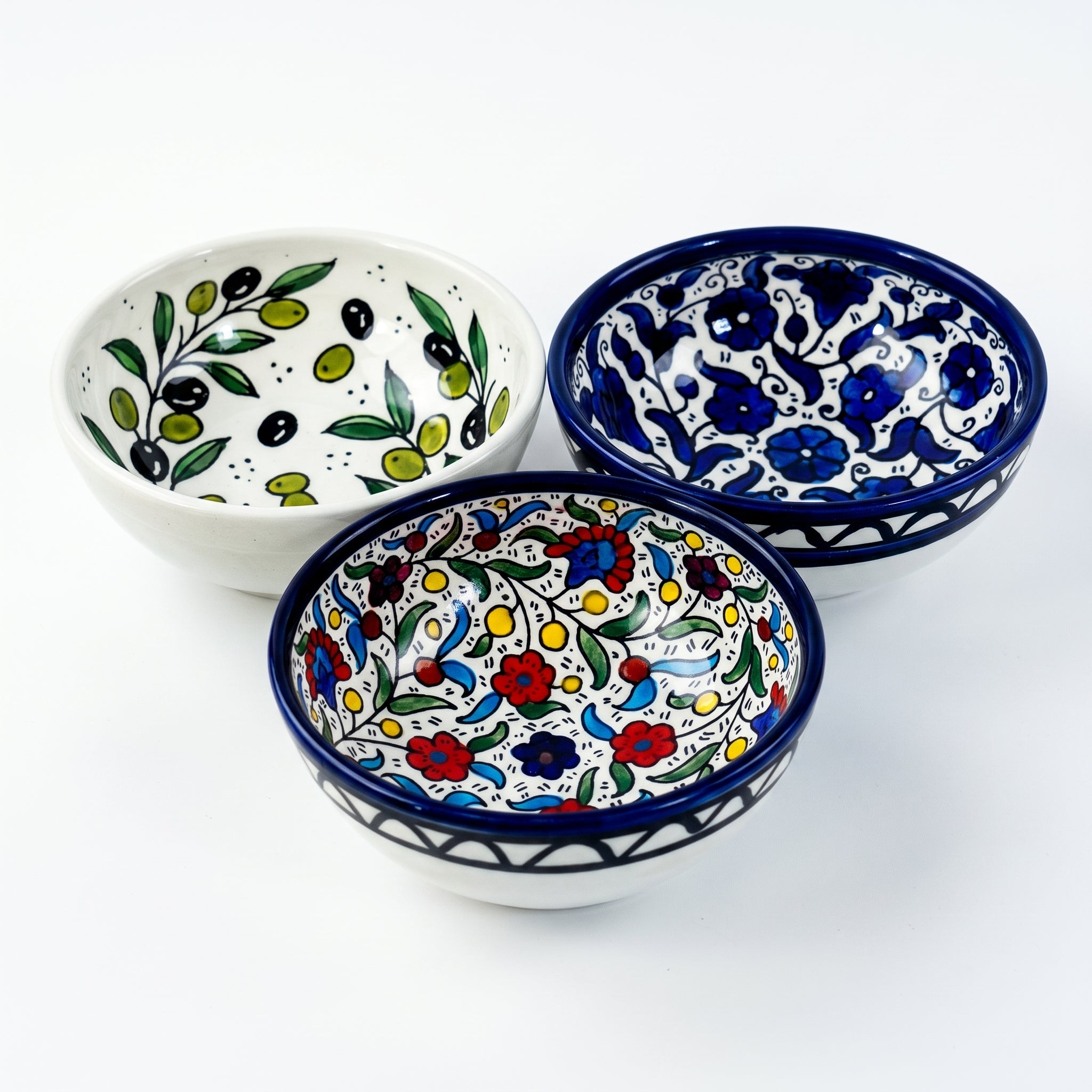 Hand-painted ceramic shown in three patterns
