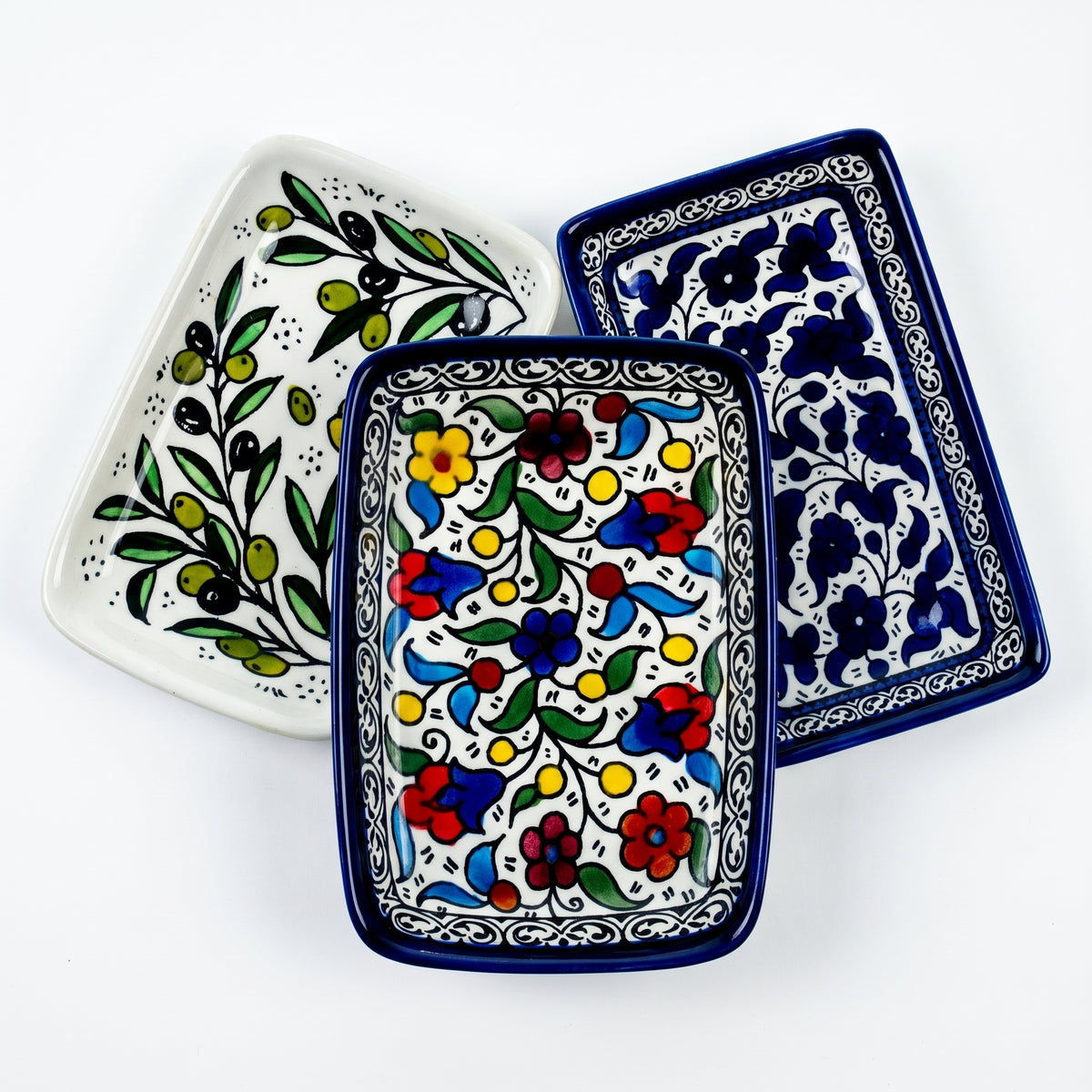 Hand-painted ceramic shown in three patterns