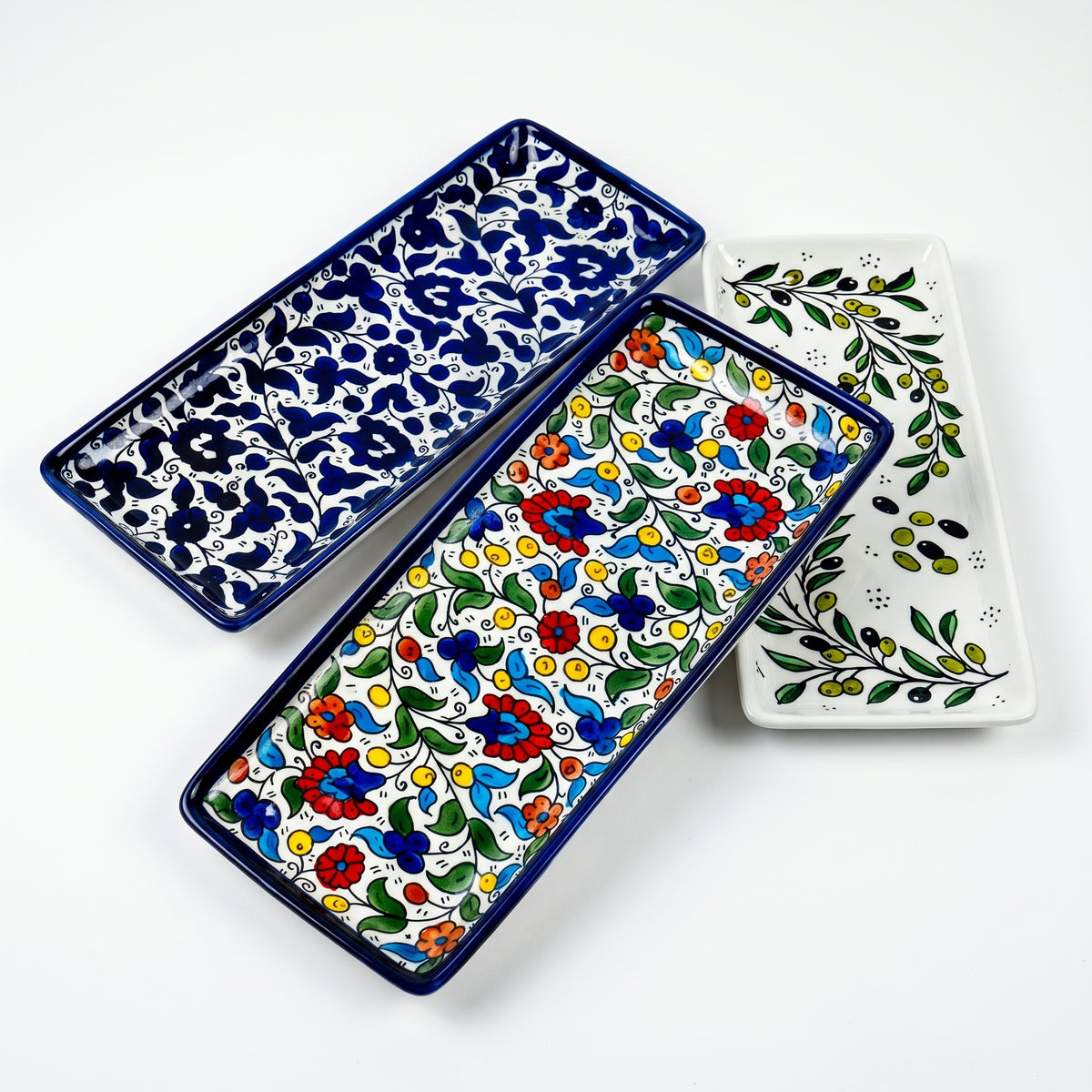 Hand-painted ceramic shown in three patterns