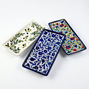 Hand-painted ceramic shown in three patterns