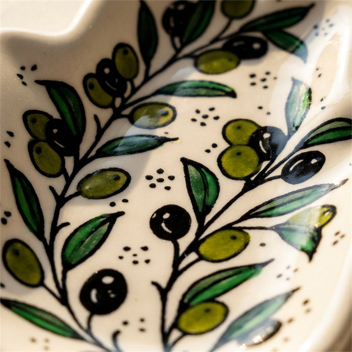 Ceramic Hamsa Dish 7.09 Inch in Olive Green, close-up of the hand-painted detail