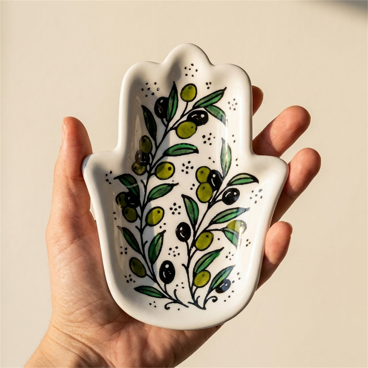 Ceramic Hamsa Dish 7.09 Inch in Olive Green, held in hands to show scale