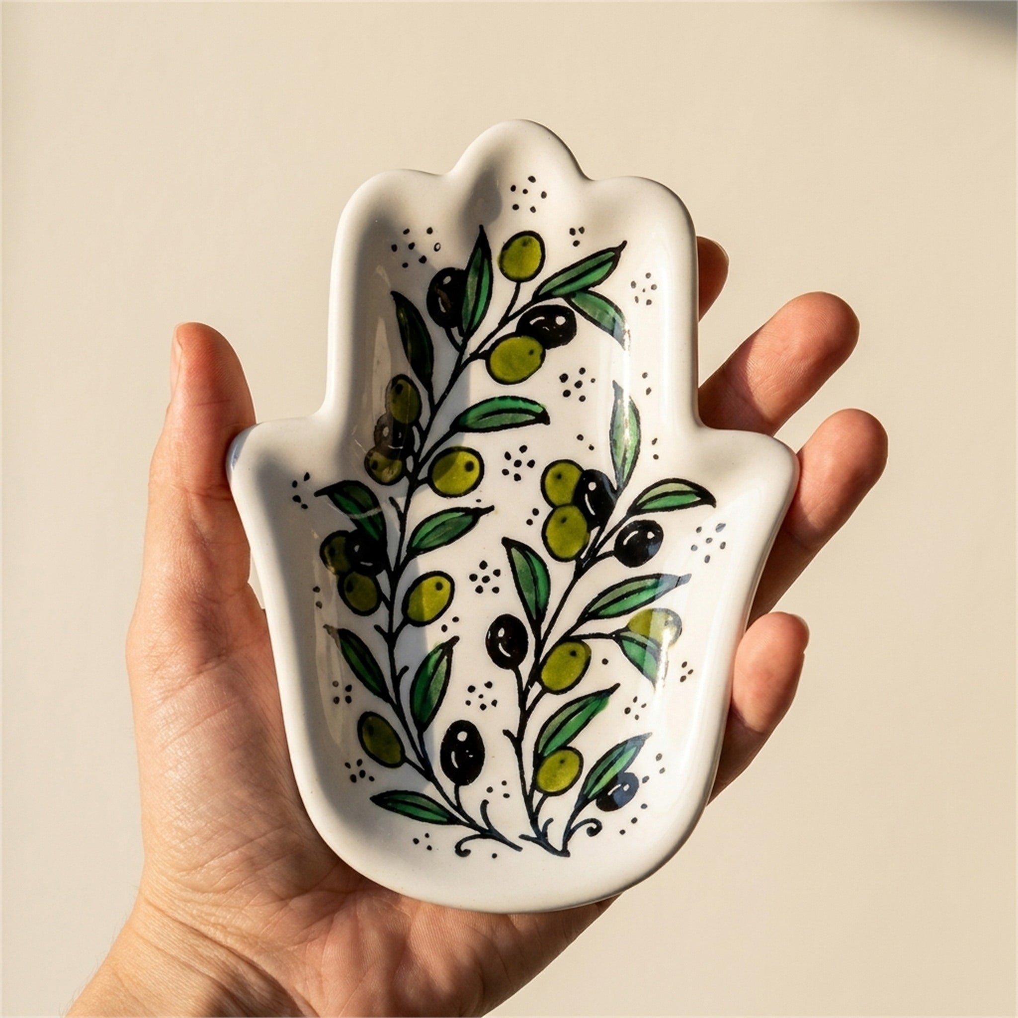 Ceramic Hamsa Dish 7.09 Inch in Olive Green, held in hands to show scale