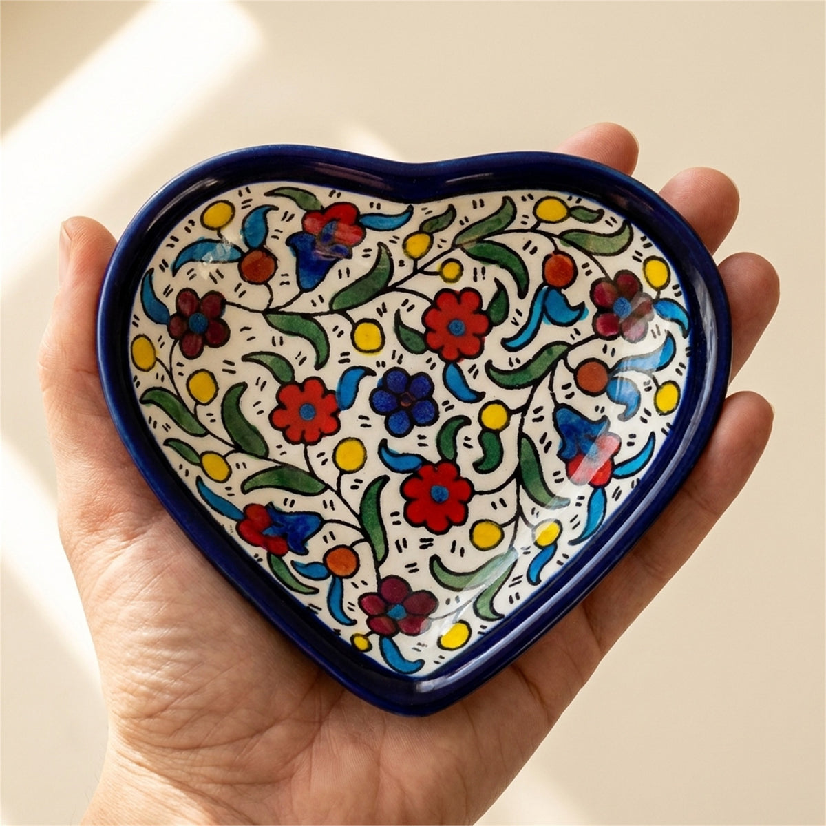 Ceramic Heart Dish 5.51 Inch in Floral, held in hands to show scale