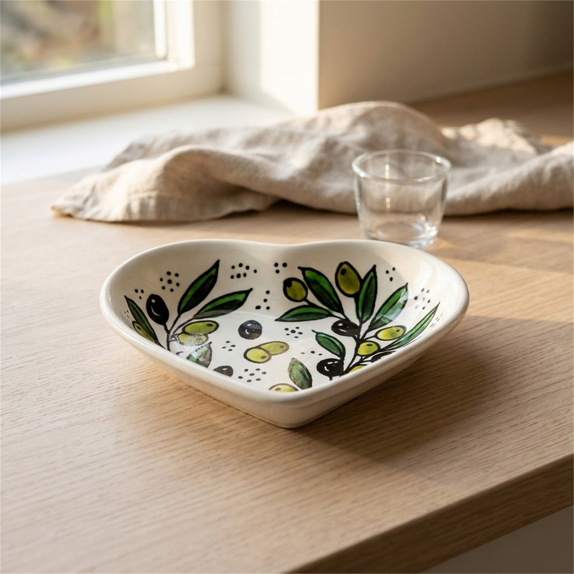 Ceramic Heart Dish 5.51 Inch in Olive Green, styled on a set table