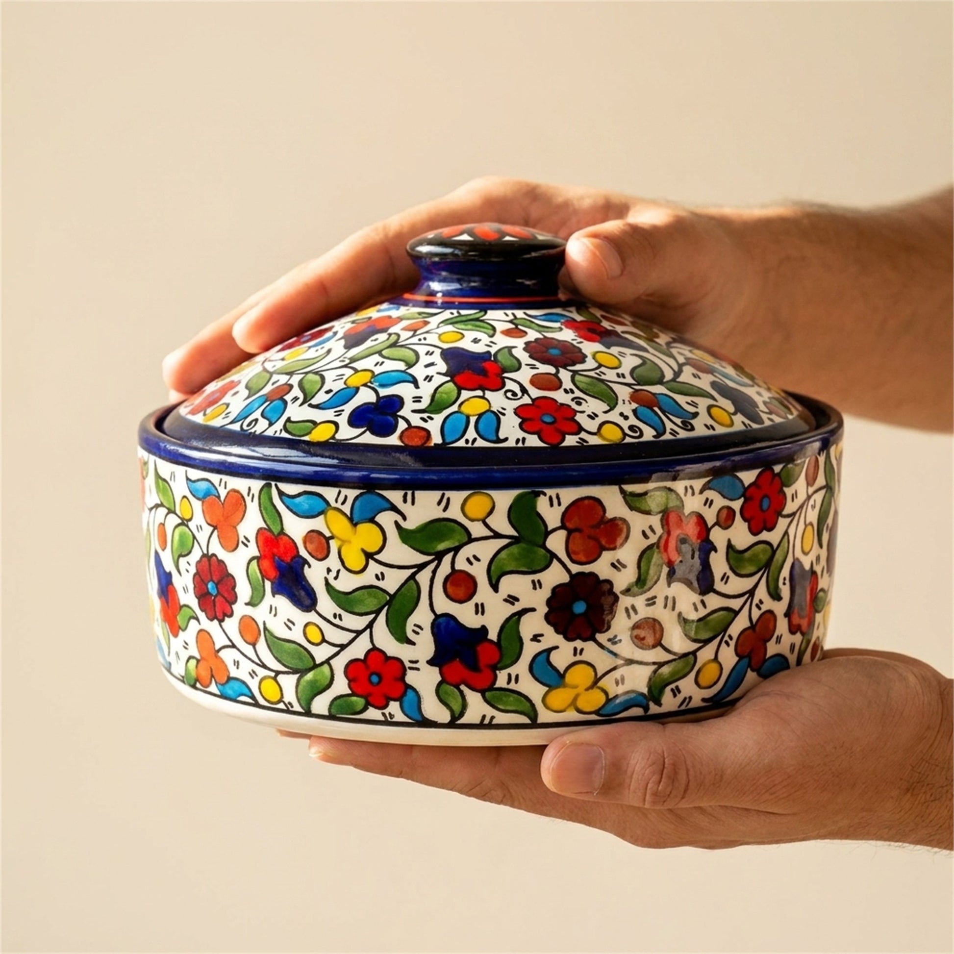 Ceramic Lidded Serving Pot 9.06 Inch in Floral, held in hands to show scale