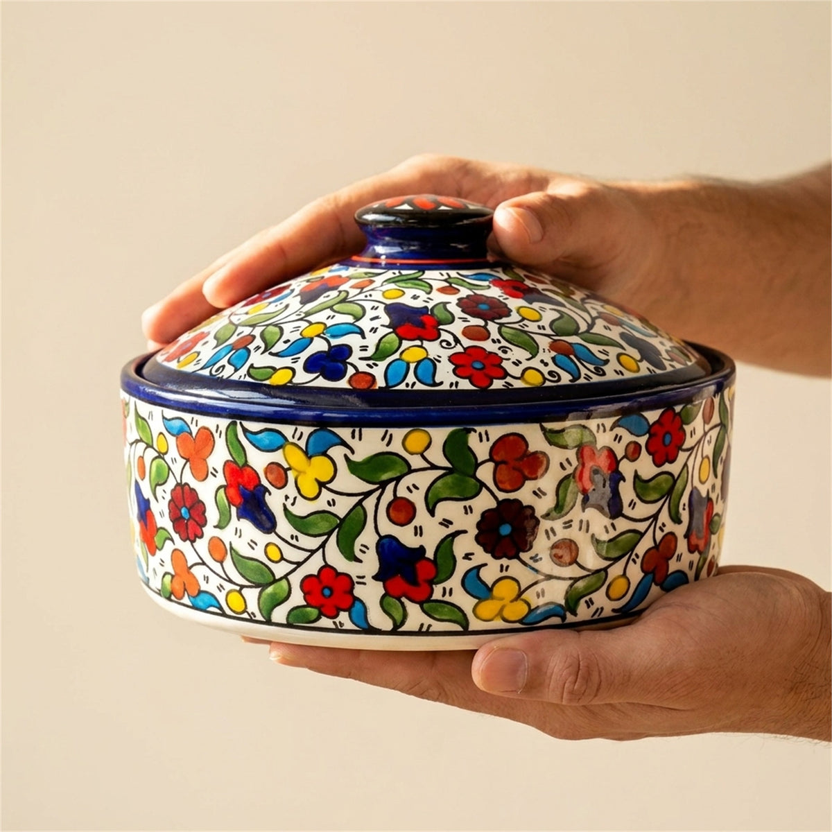 Ceramic Lidded Serving Pot 9.06 Inch in Floral, held in hands to show scale