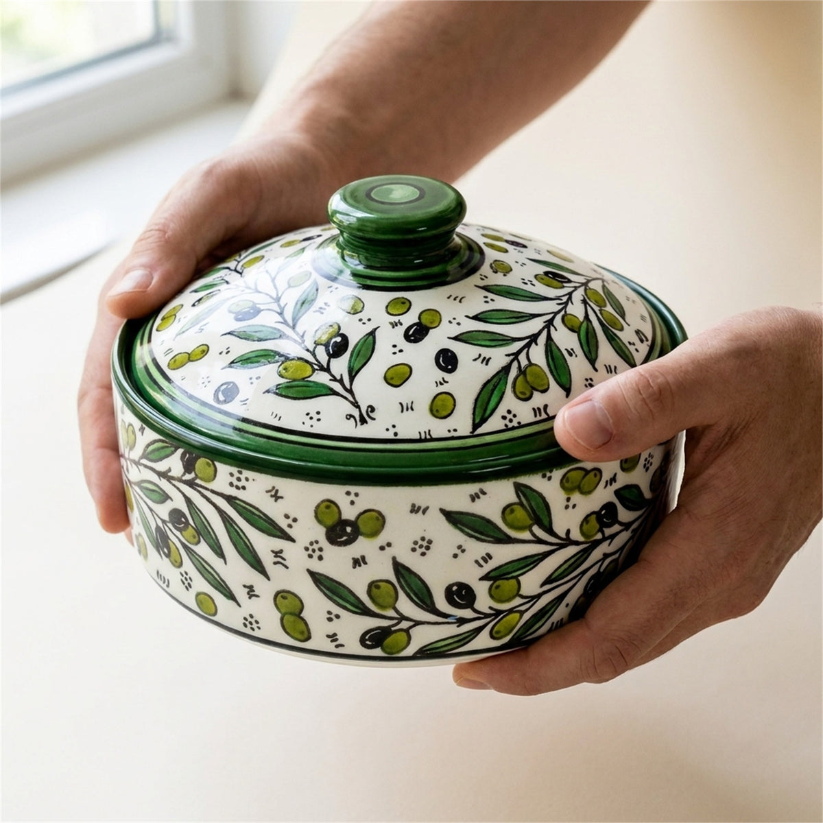 Ceramic Lidded Serving Pot 9.06 Inch in Olive Green, held in hands to show scale