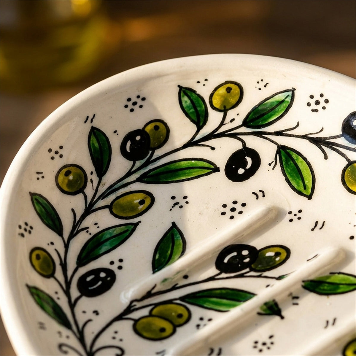 Ceramic Oval Serving Dish 5.51 Inch in Olive Green, close-up of the hand-painted detail