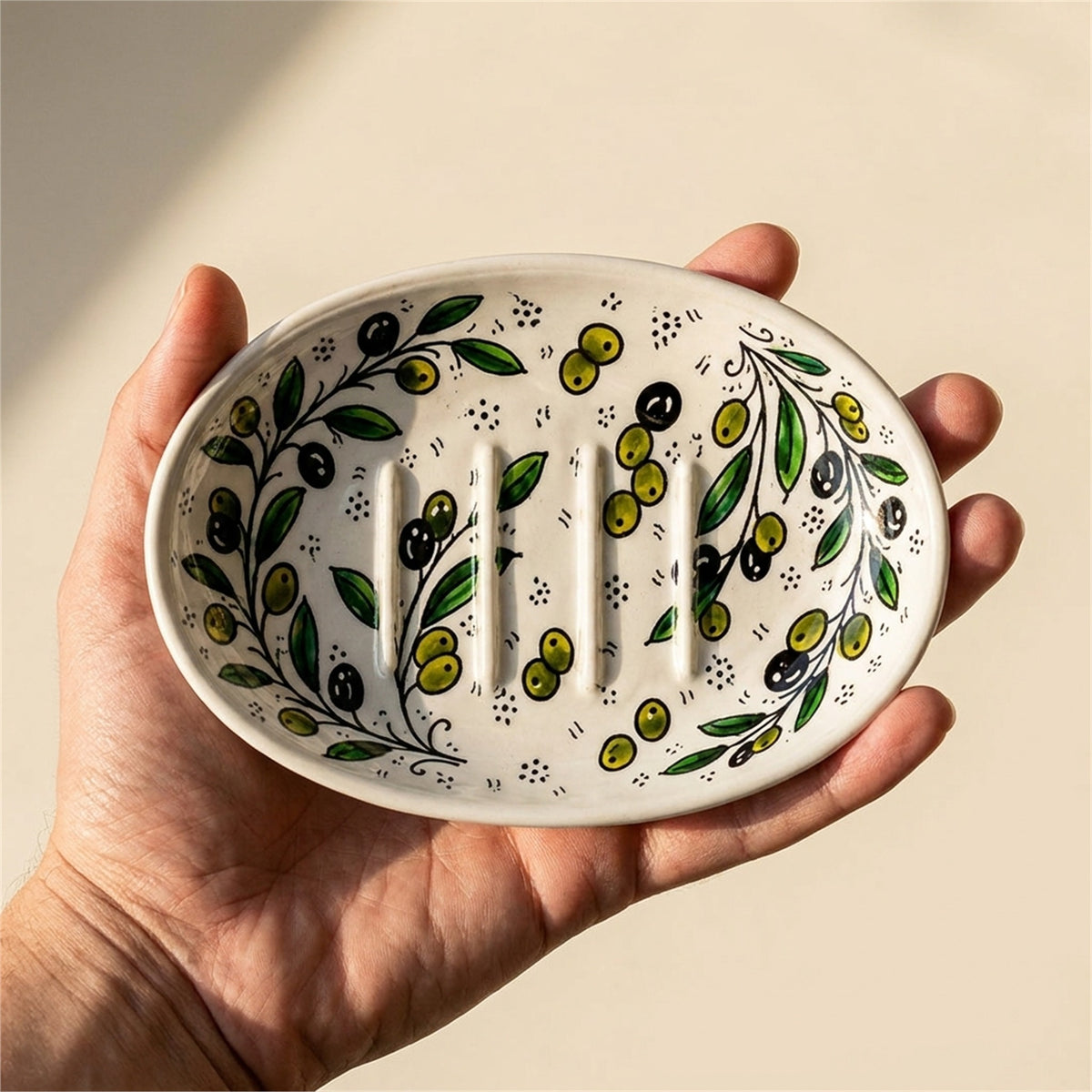 Ceramic Oval Serving Dish 5.51 Inch in Olive Green, held in hands to show scale