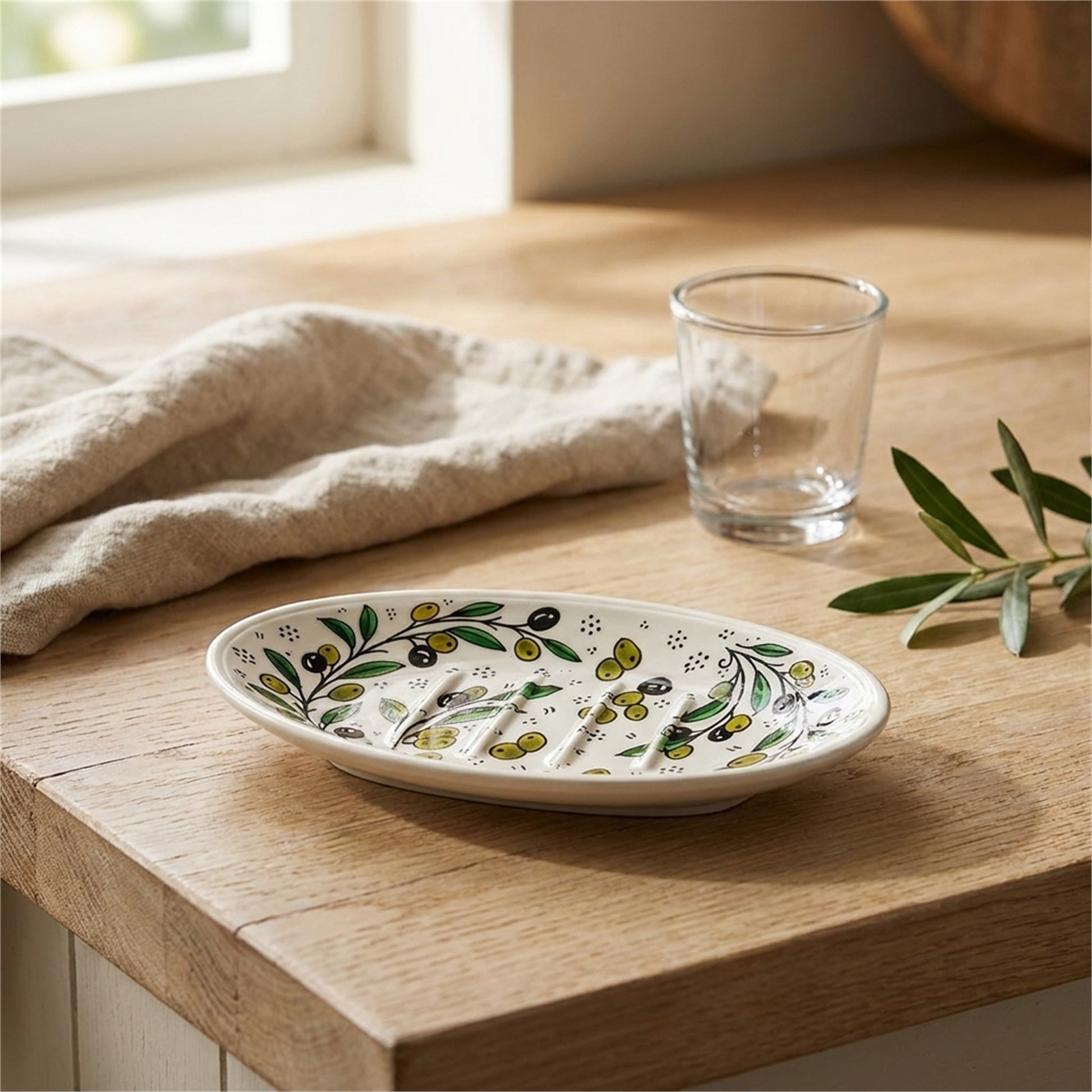 Ceramic Oval Serving Dish 5.51 Inch in Olive Green, styled on a set table