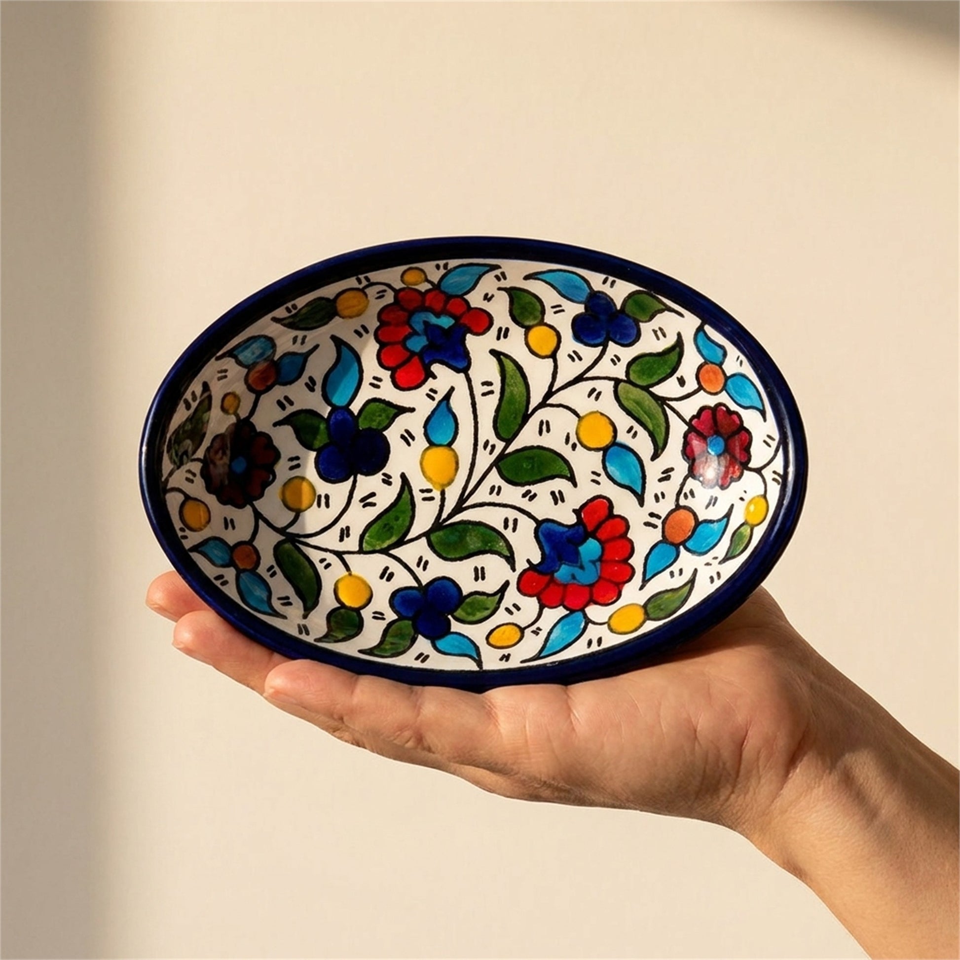 Ceramic Oval Serving Dish 6.69 Inch in Floral, held in hands to show scale
