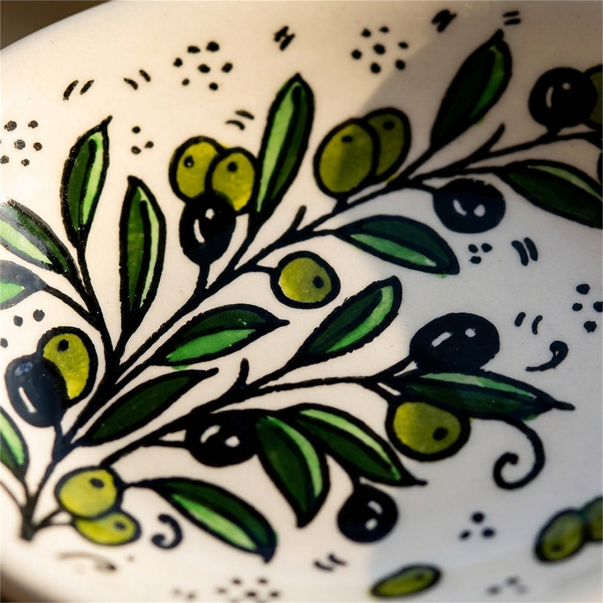 Ceramic Oval Serving Dish 6.69 Inch in Olive Green, close-up of the hand-painted detail