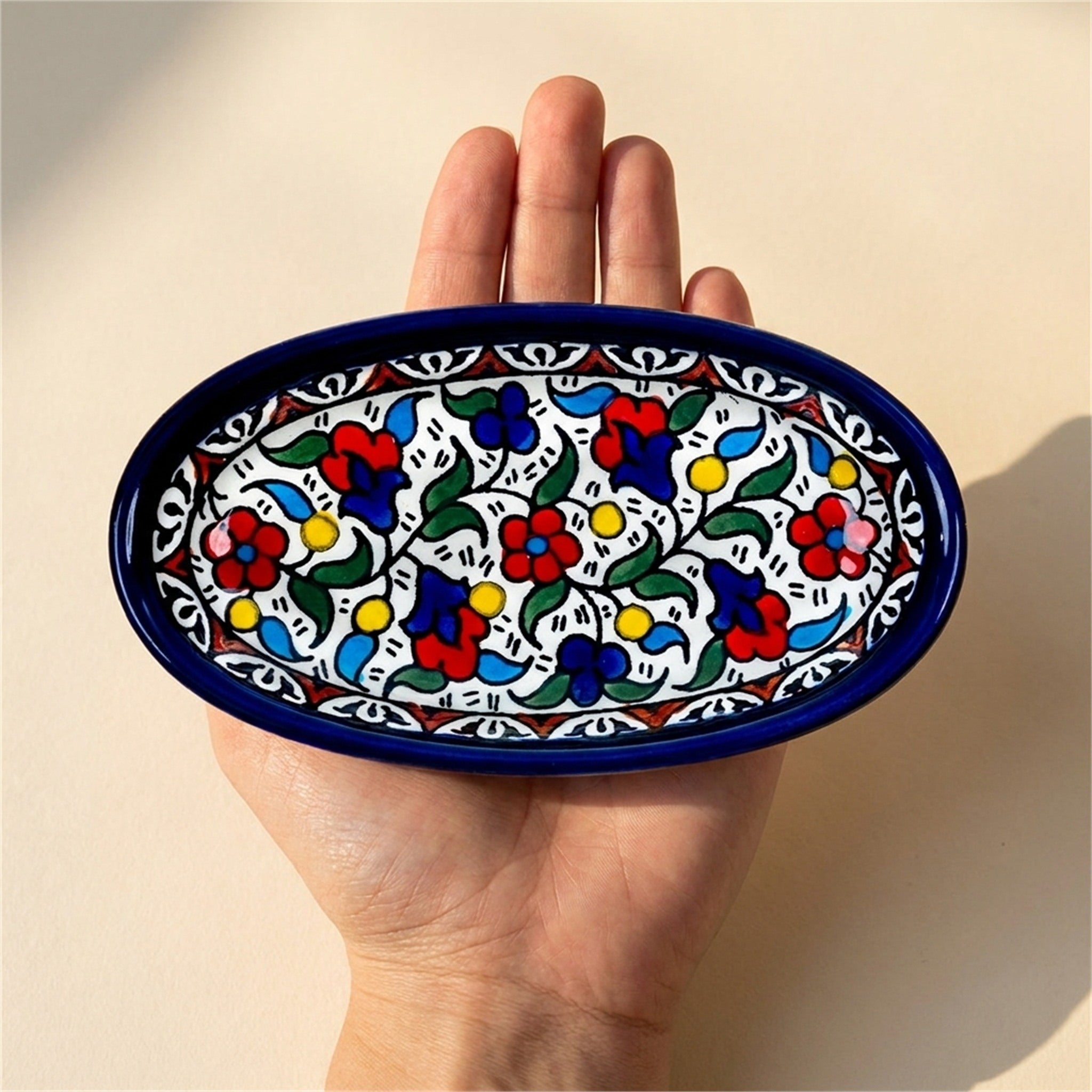 Ceramic Oval Serving Dish 6.7 Inch in Floral, held in hands to show scale