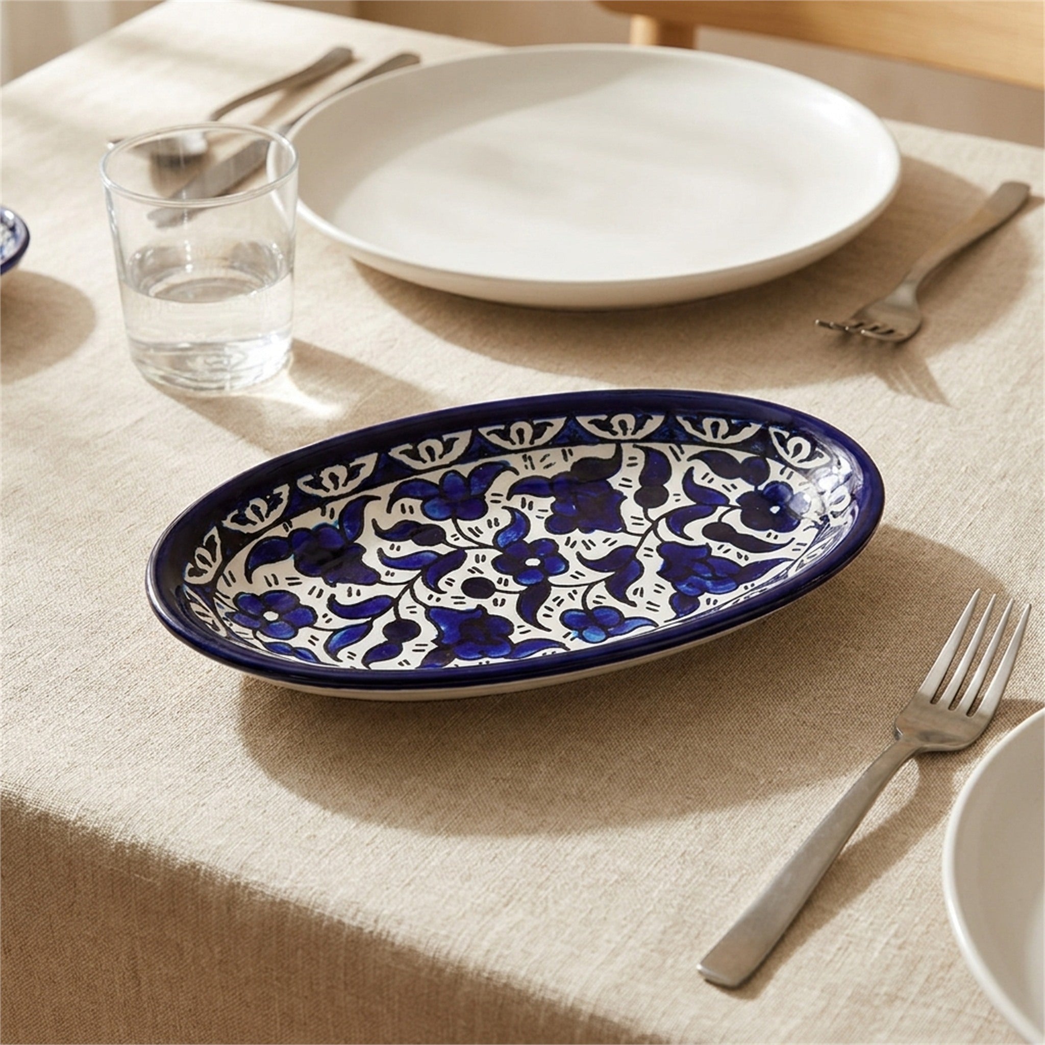 Ceramic Oval Serving Dish 6.7 Inch in Indigo, styled on a set table
