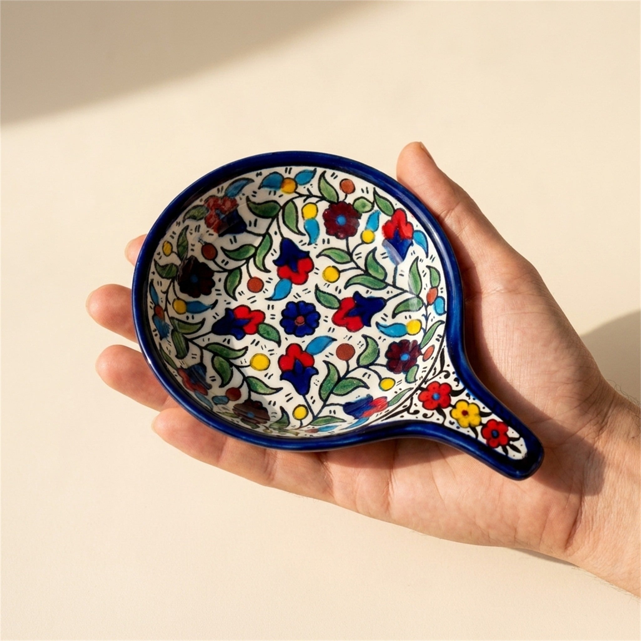 Ceramic Single Handle Bowl 5.12 Inch in Floral, held in hands to show scale