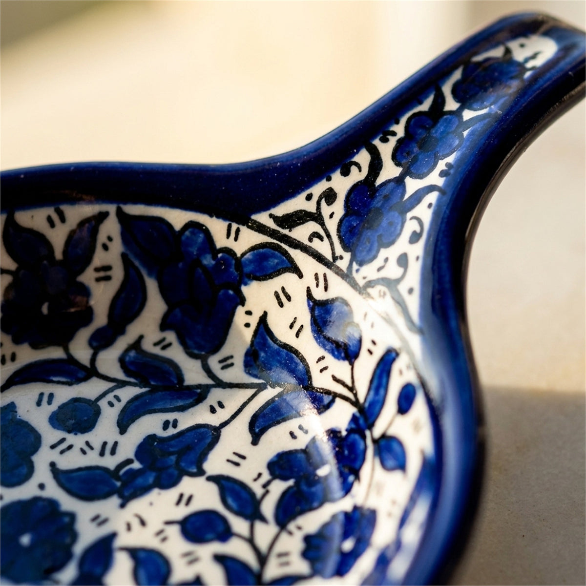 Ceramic Single Handle Bowl 5.12 Inch in Indigo, close-up of the hand-painted detail