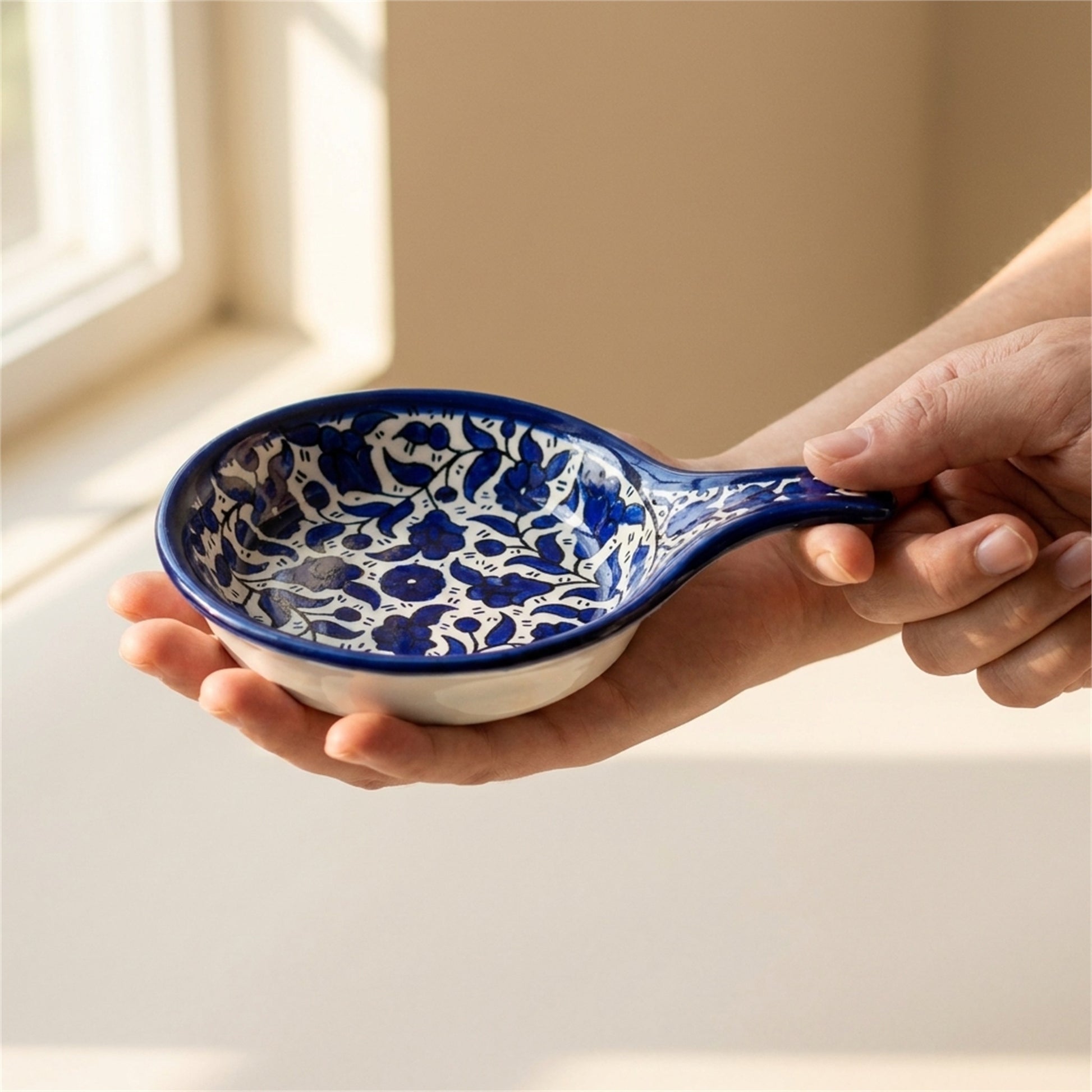 Ceramic Single Handle Bowl 5.12 Inch in Indigo, held in hands to show scale