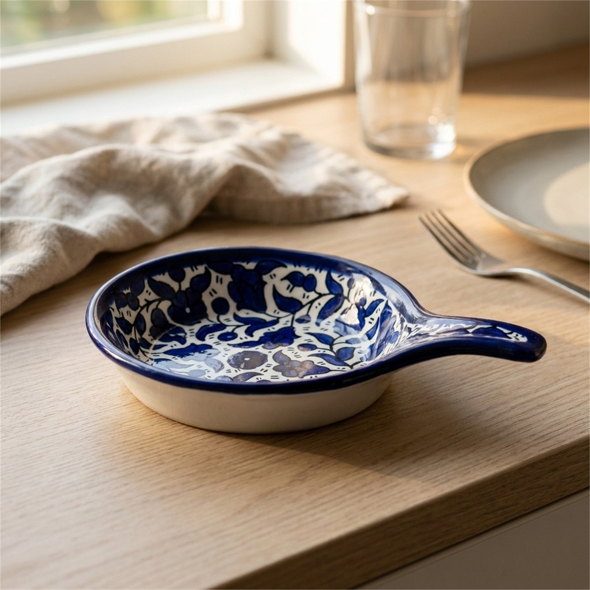 Ceramic Single Handle Bowl 5.12 Inch in Indigo, styled on a set table