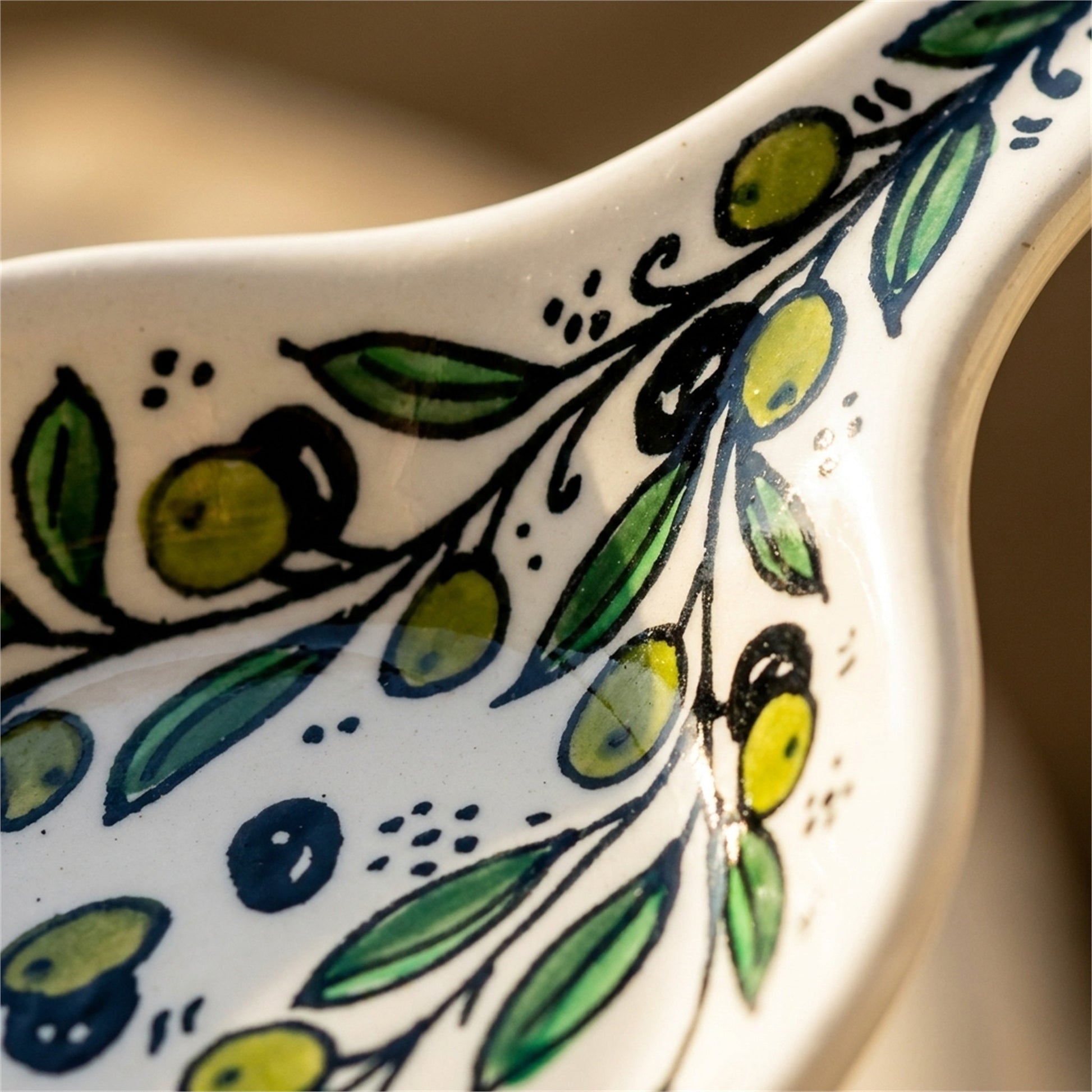 Ceramic Single Handle Bowl 5.12 Inch in Olive Green, close-up of the hand-painted detail