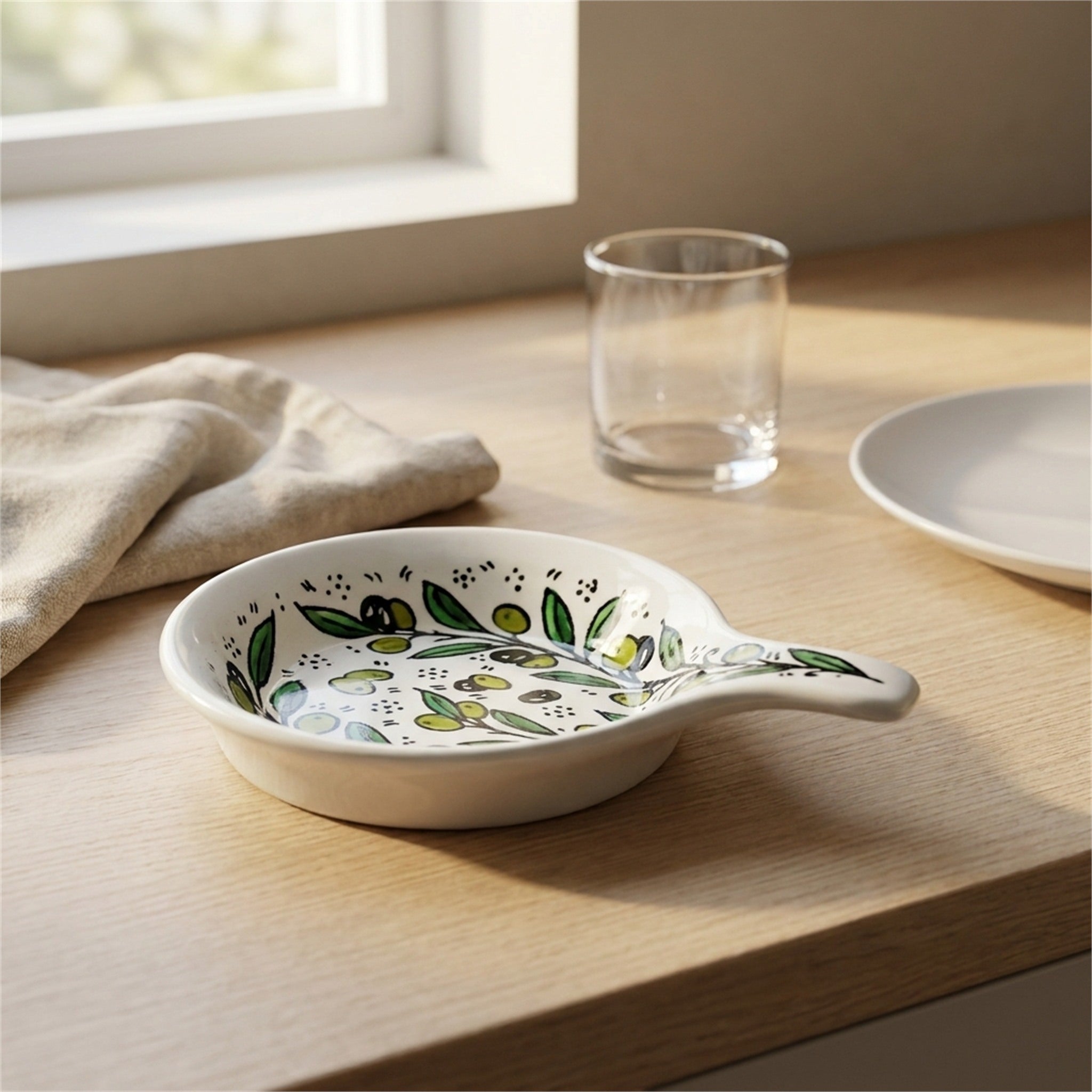 Ceramic Single Handle Bowl 5.12 Inch in Olive Green, styled on a set table
