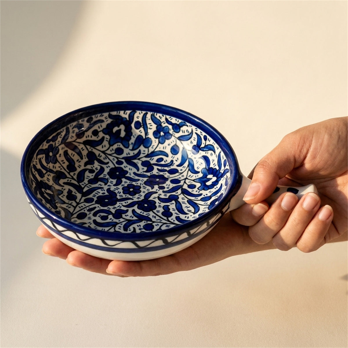 Ceramic Single Handle Bowl 6.3 Inch in Indigo, held in hands to show scale