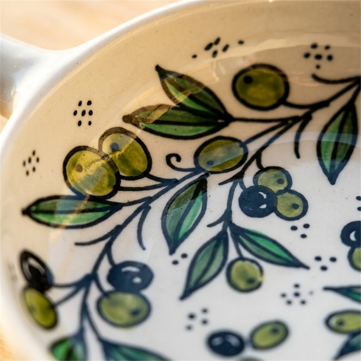 Ceramic Single Handle Bowl 6.3 Inch in Olive Green, close-up of the hand-painted detail