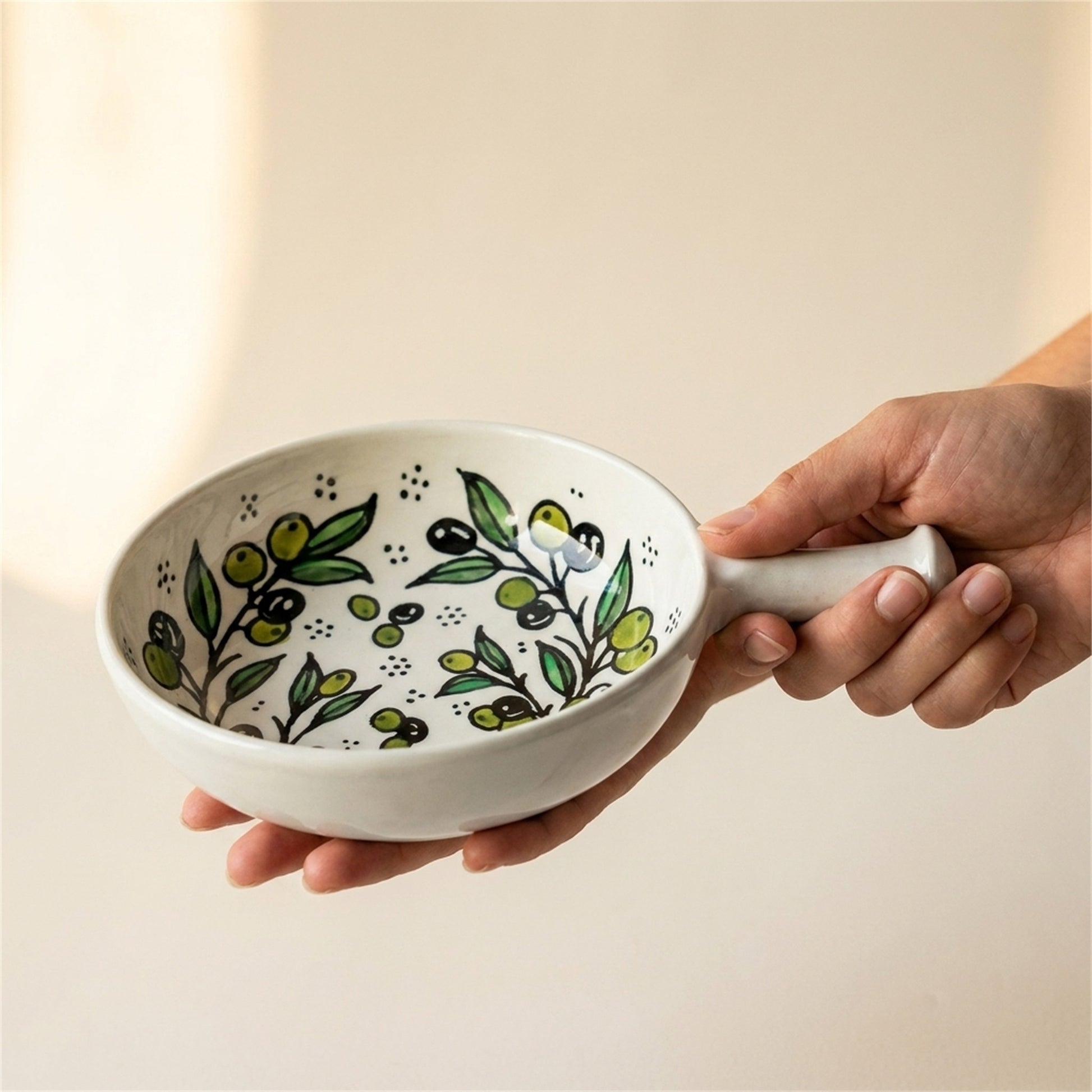 Ceramic Single Handle Bowl 6.3 Inch in Olive Green, held in hands to show scale