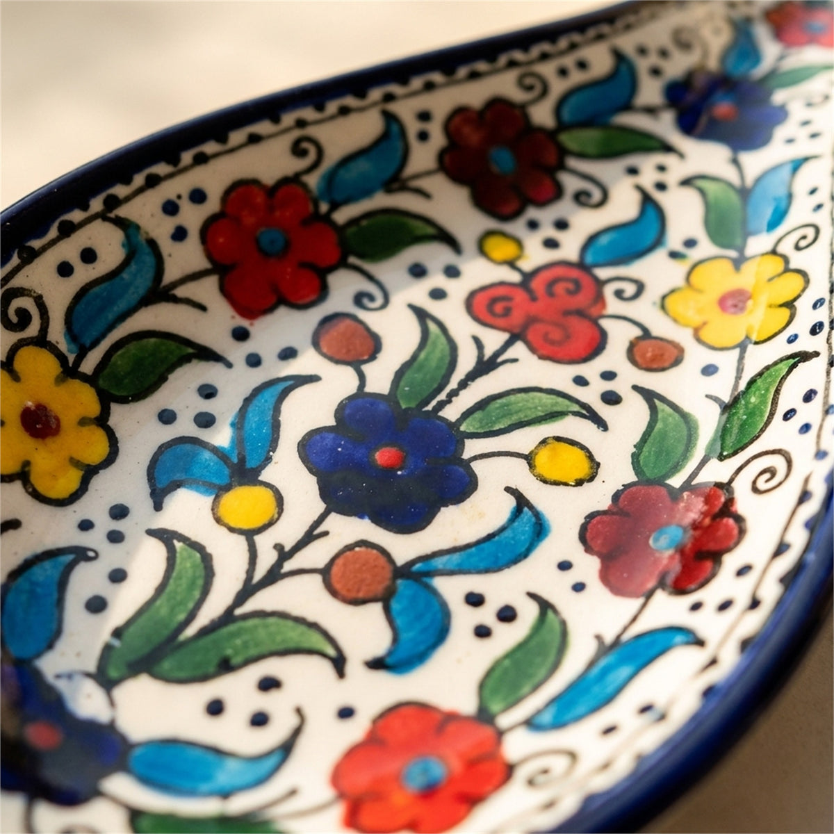 Ceramic Spoon Rest 9.84 Inch in Floral, close-up of the hand-painted detail