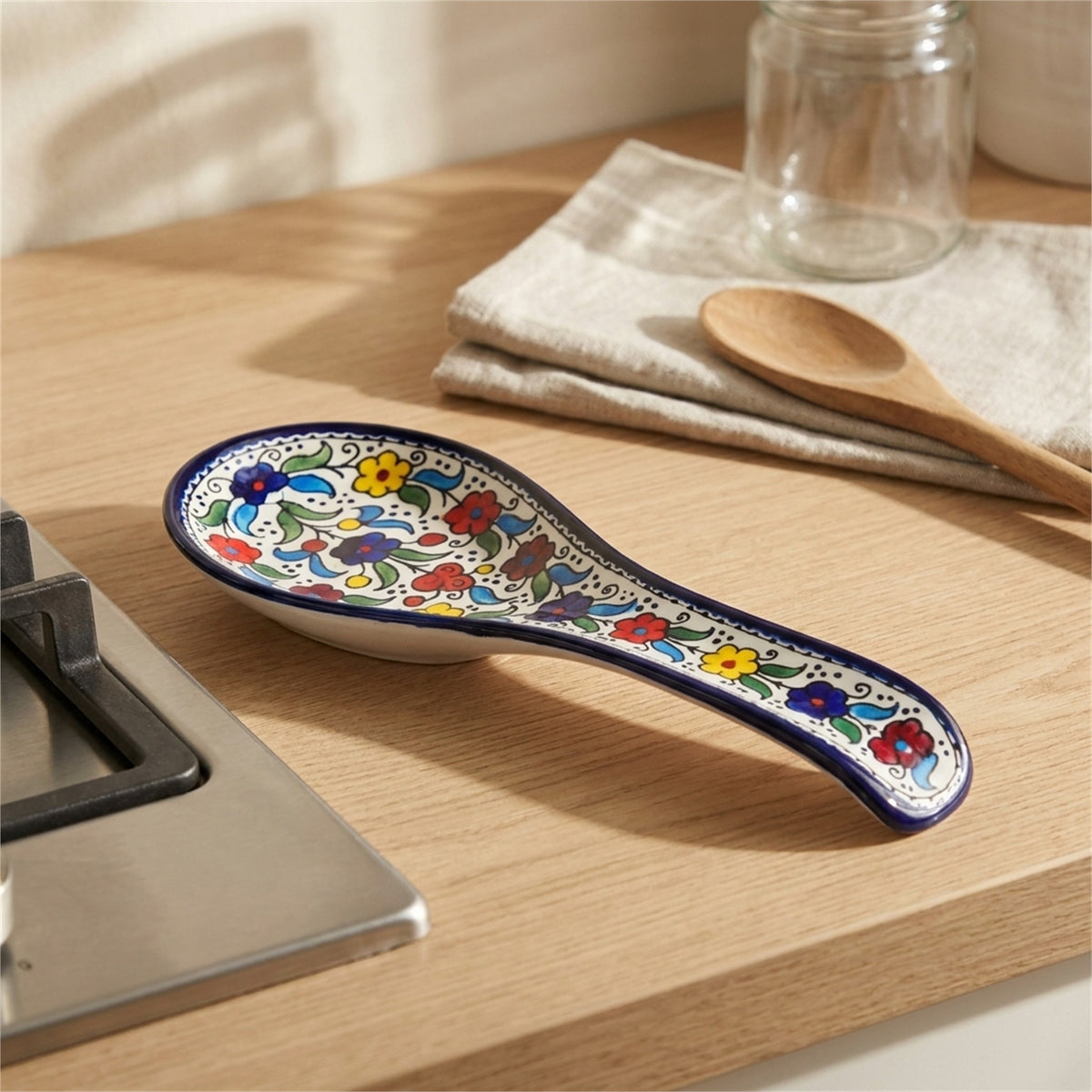 Ceramic Spoon Rest 9.84 Inch in Floral, styled on a set table