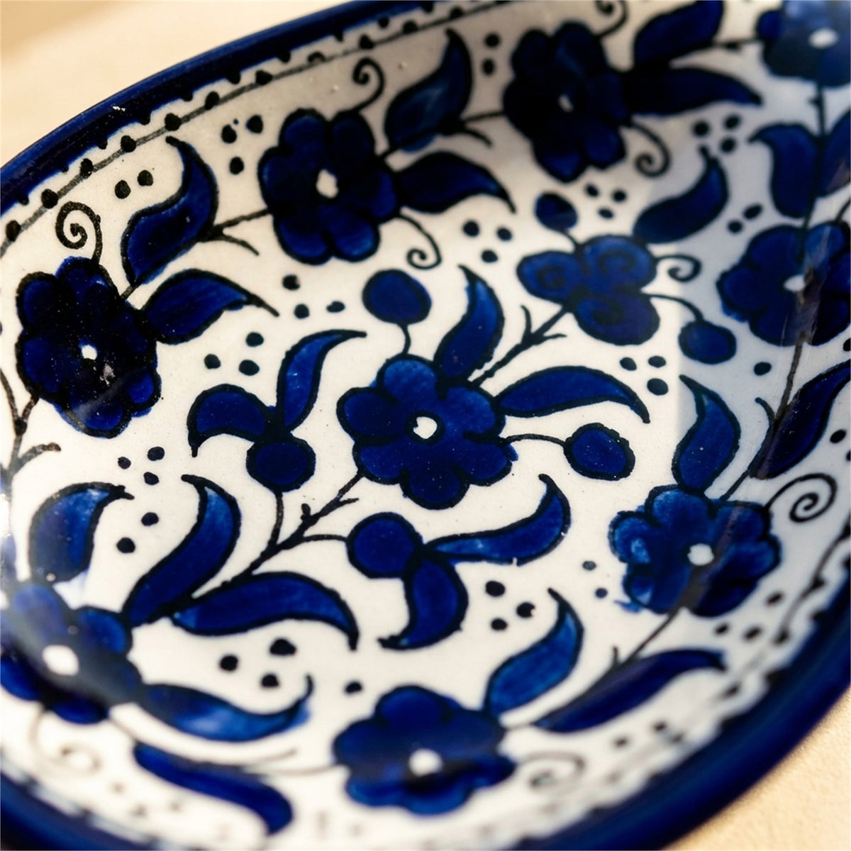 Ceramic Spoon Rest 9.84 Inch in Indigo, close-up of the hand-painted detail