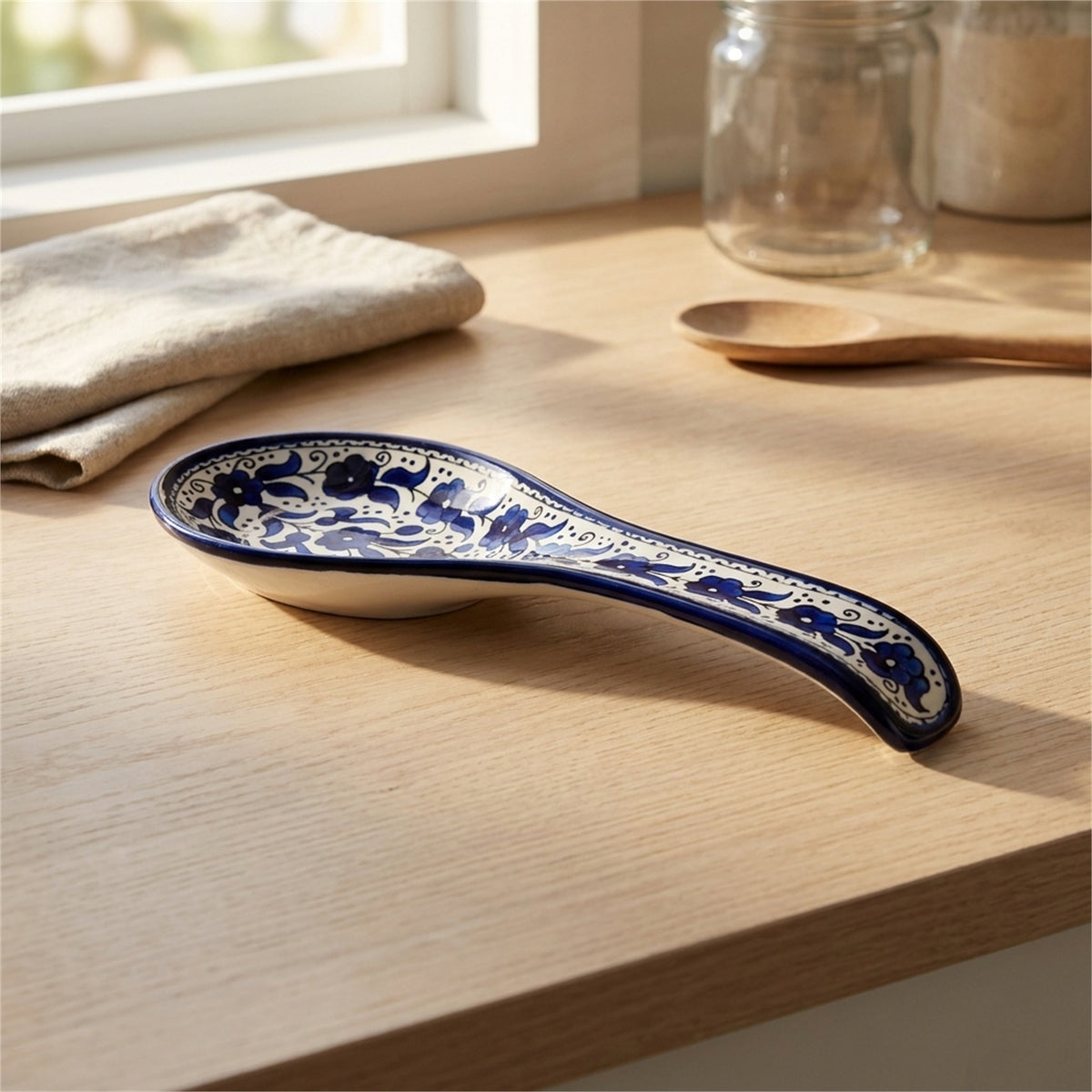 Ceramic Spoon Rest 9.84 Inch in Indigo, styled on a set table