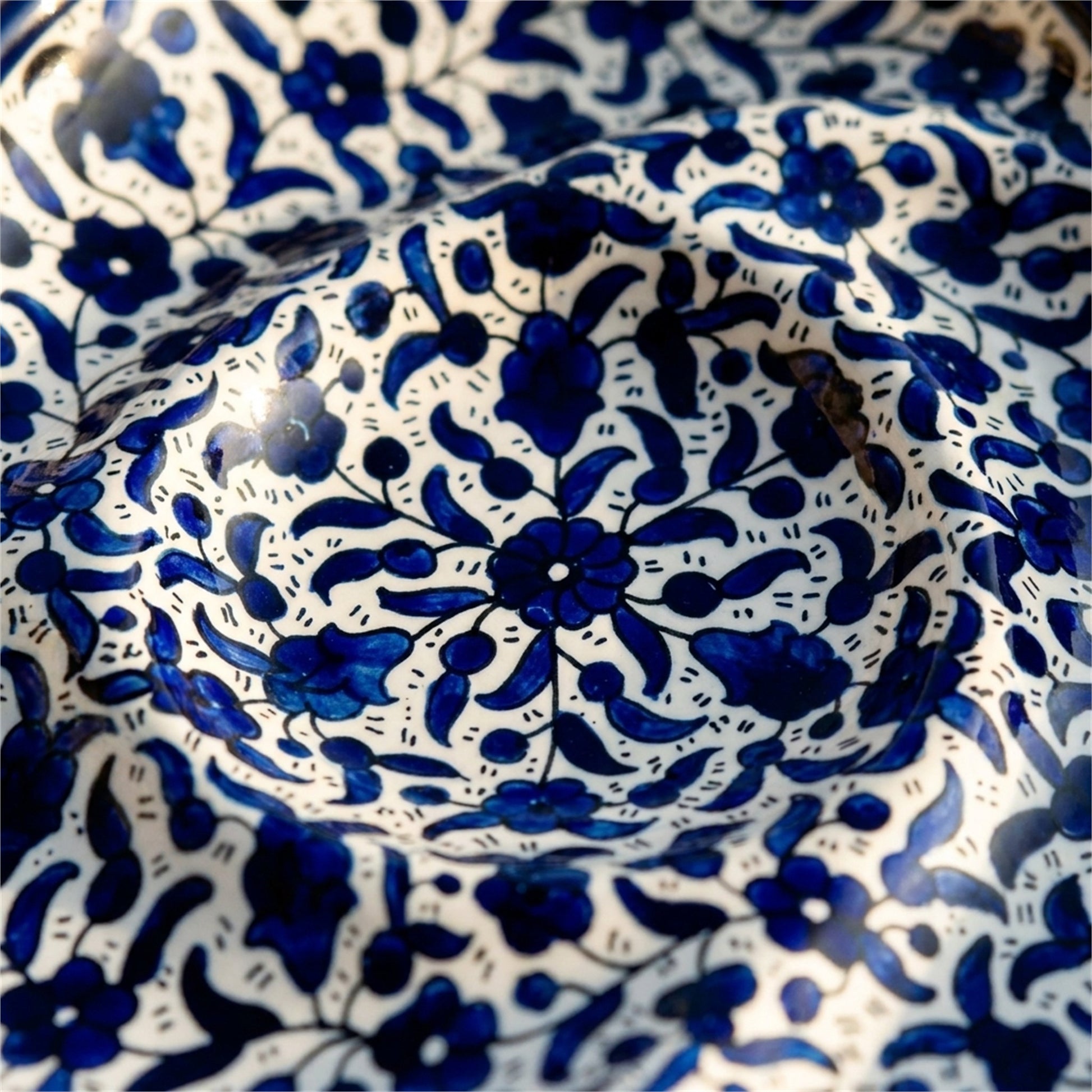 Ceramic Trefoil Dish 9.84 Inch in Indigo, close-up of the hand-painted detail