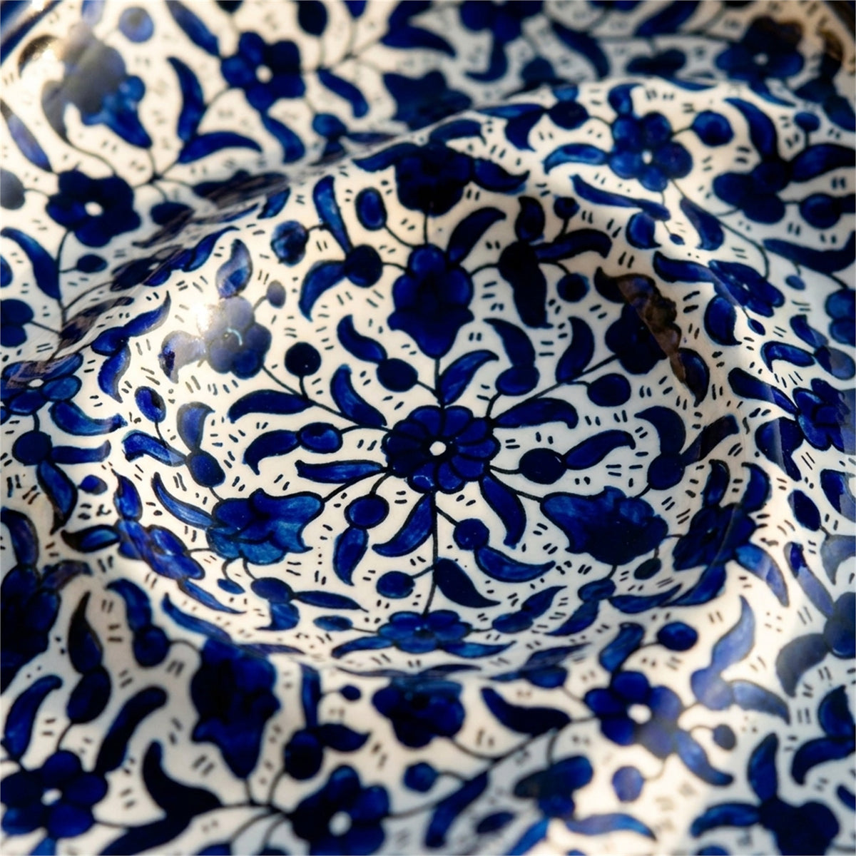 Ceramic Trefoil Dish 9.84 Inch in Indigo, close-up of the hand-painted detail