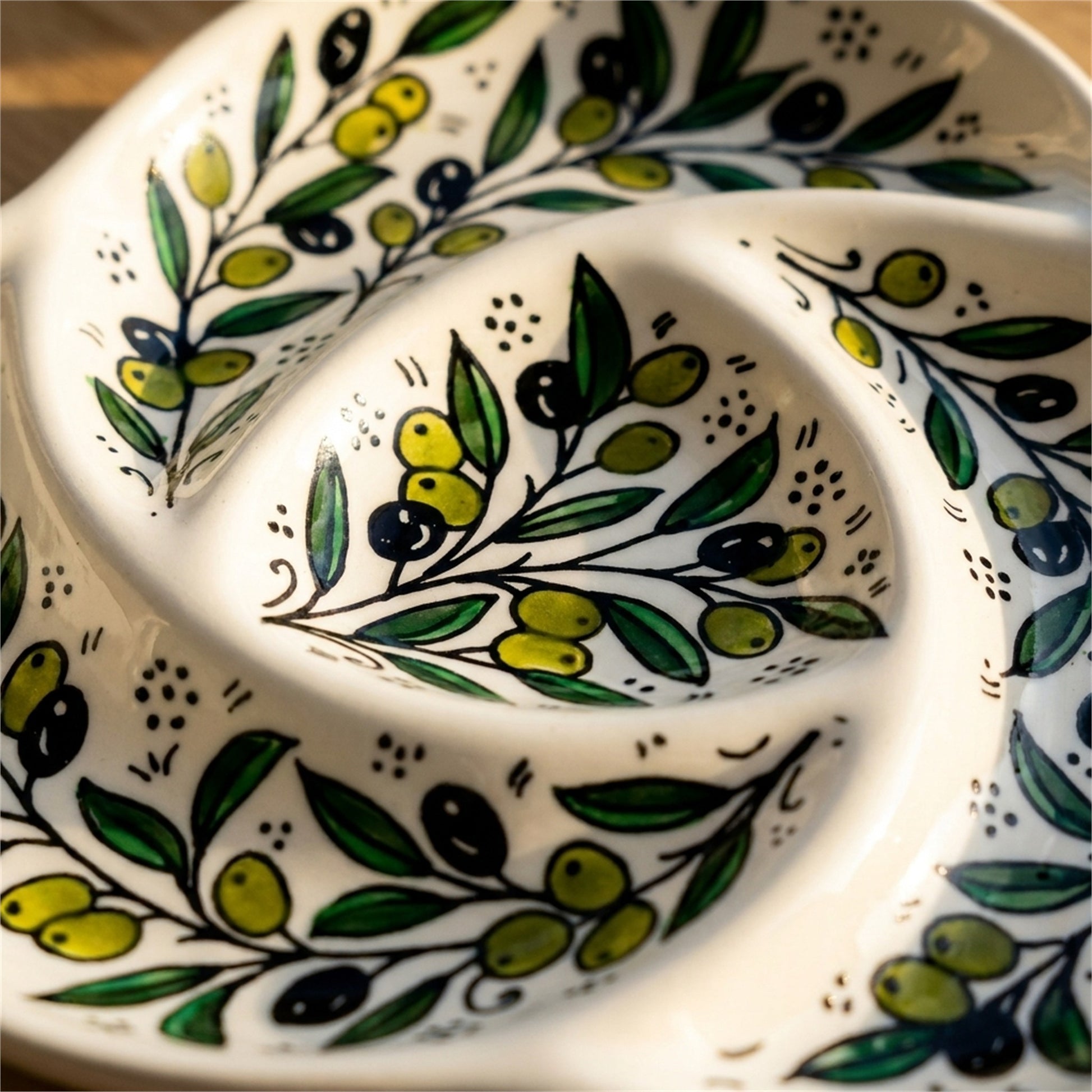 Ceramic Trefoil Dish 9.84 Inch in Olive Green, close-up of the hand-painted detail