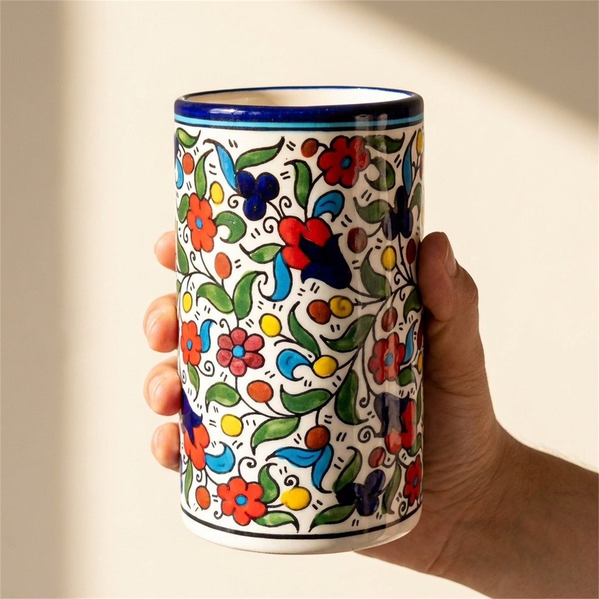 Ceramic Utensil Holder 3.94 Inch in Floral, held in hands to show scale