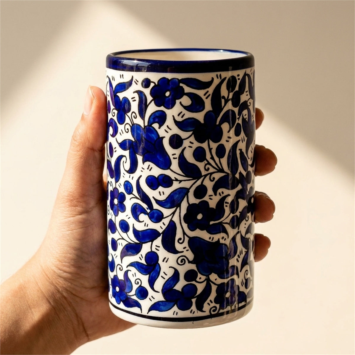 Ceramic Utensil Holder 3.94 Inch in Indigo, held in hands to show scale