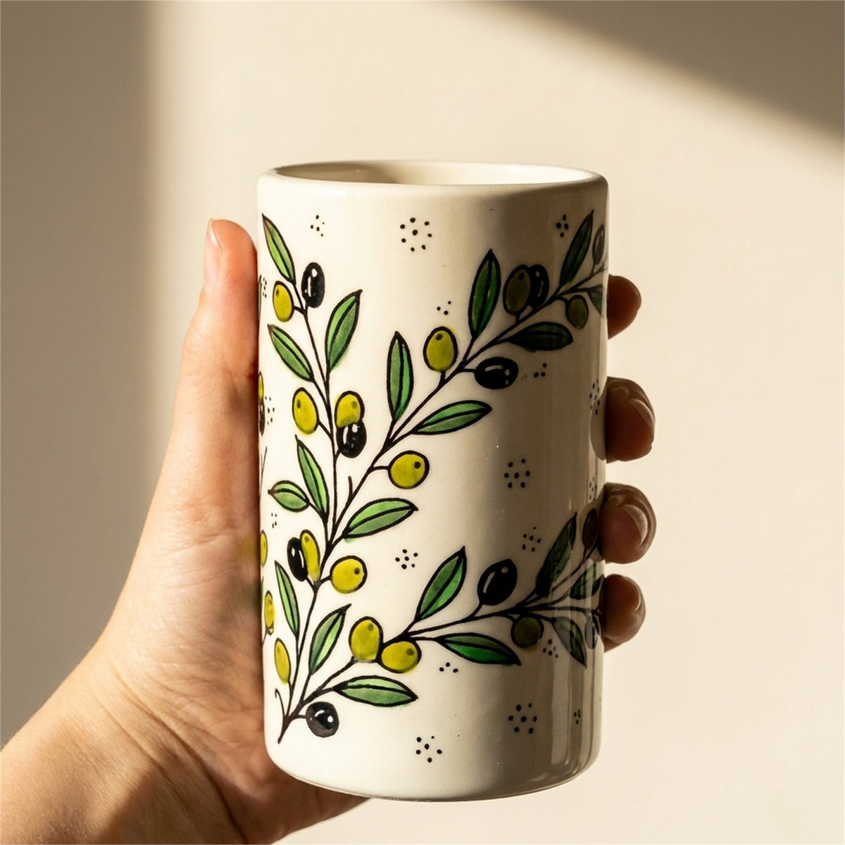 Ceramic Utensil Holder 3.94 Inch in Olive Green, held in hands to show scale