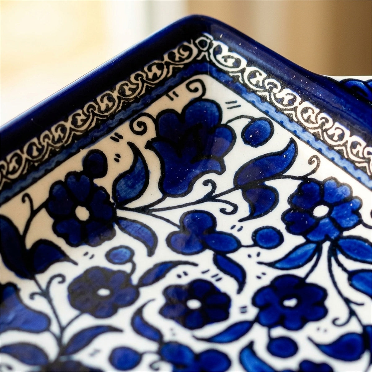 Handled Serving Dish 6.3 Inch in Indigo, close-up of the hand-painted detail