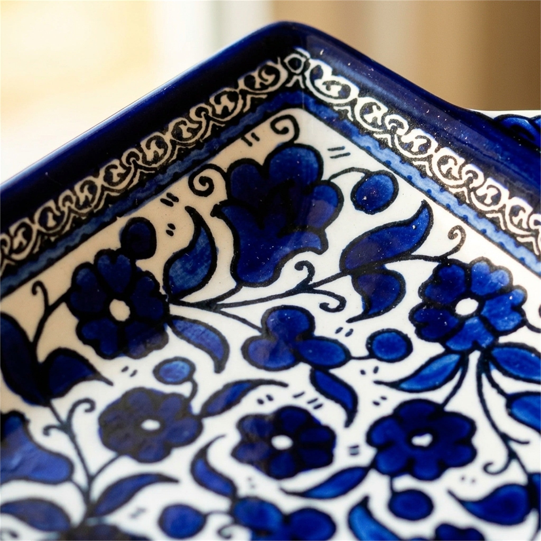 Handled Serving Dish 6.3 Inch in Indigo, close-up of the hand-painted detail