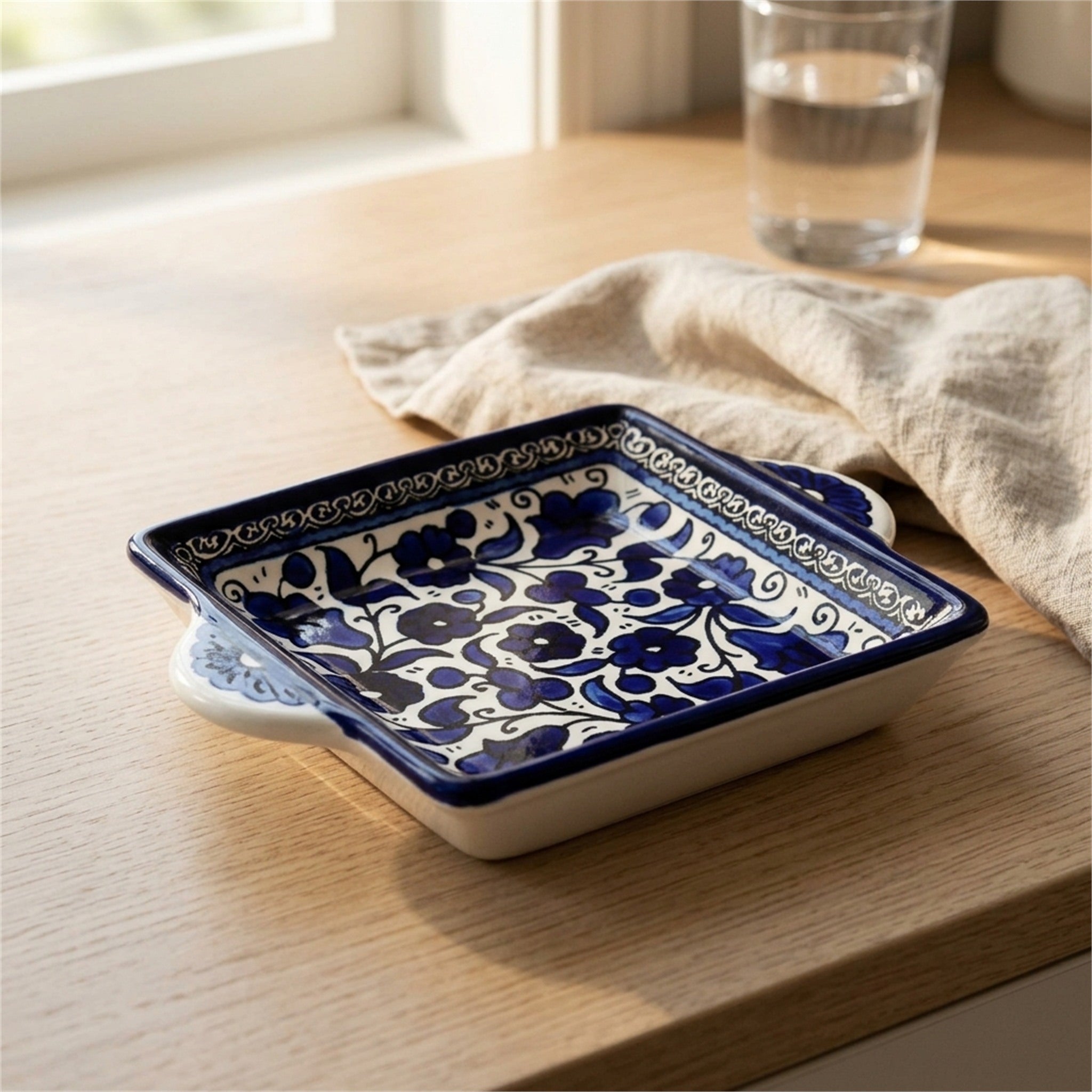 Handled Serving Dish 6.3 Inch in Indigo, styled on a set table