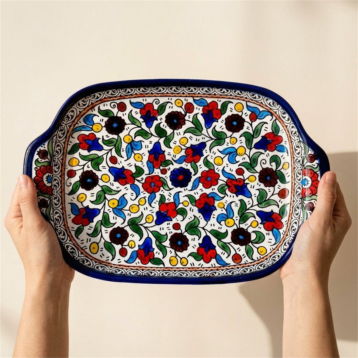 Handled Serving Platter 11.81 Inch in Floral, held in hands to show scale