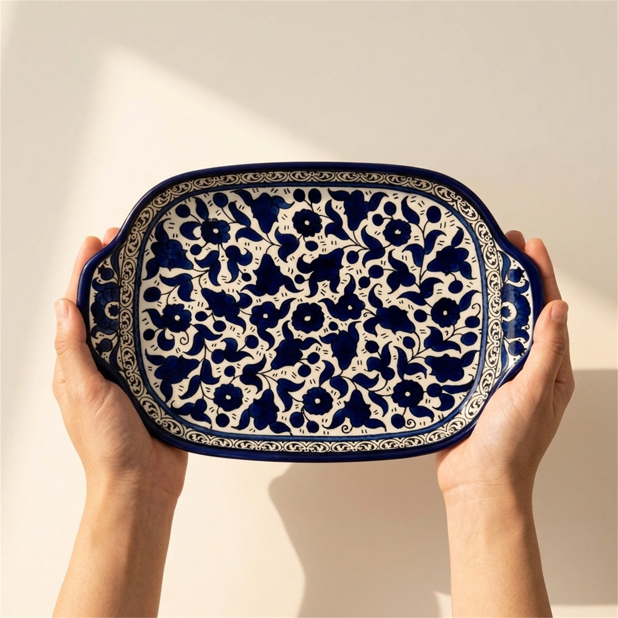 Handled Serving Platter 11.81 Inch in Indigo, held in hands to show scale