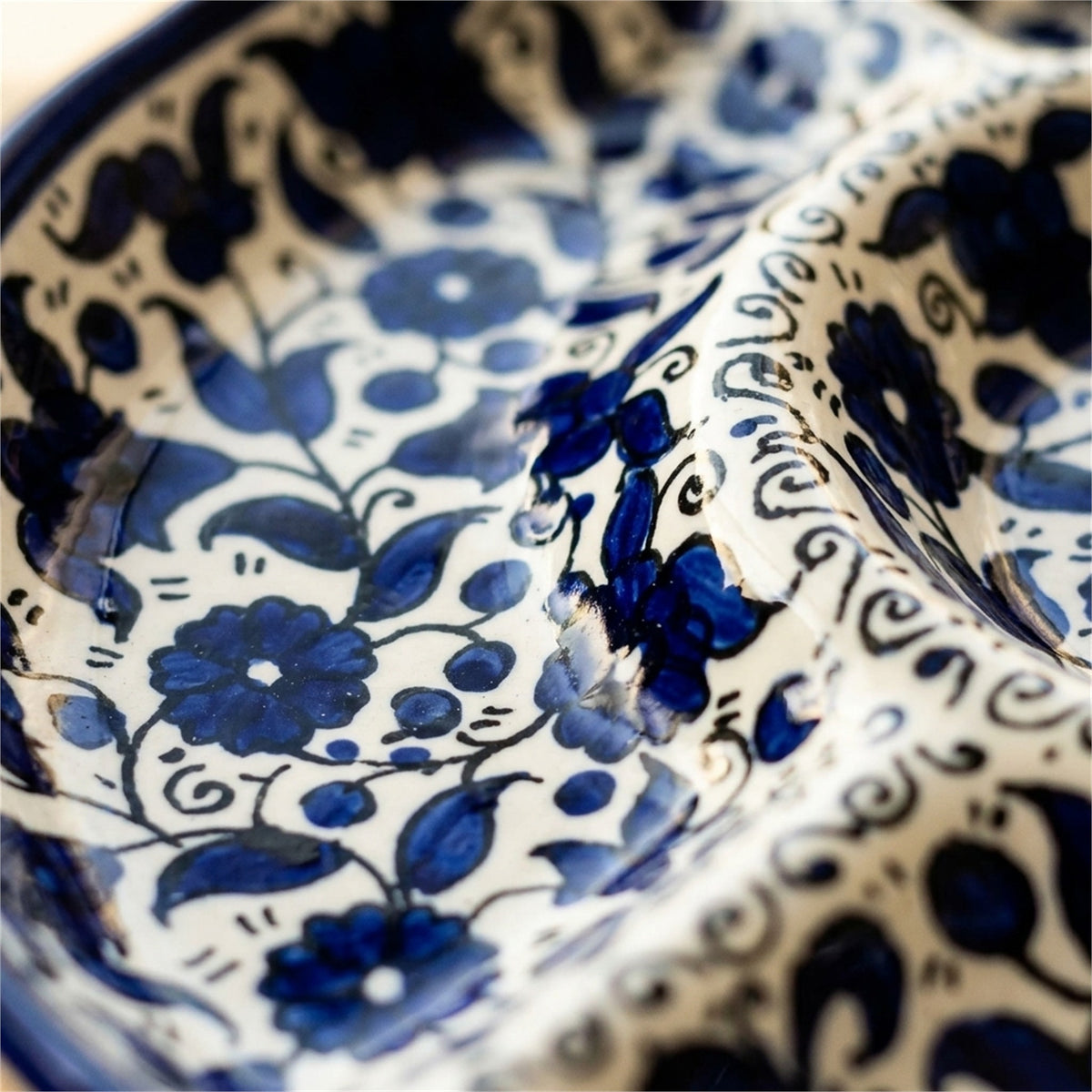Round Ceramic 5-Section Serving Set 9.45 Inch in Indigo, close-up of the hand-painted detail