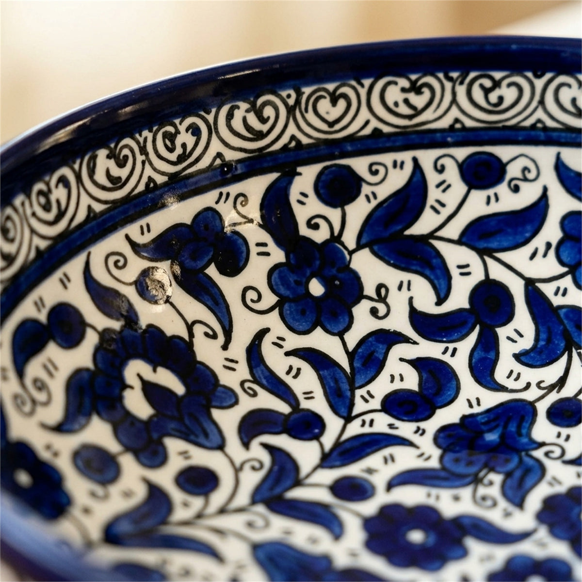 Round Ceramic Serving Bowl 9.45 Inch in Indigo, close-up of the hand-painted detail