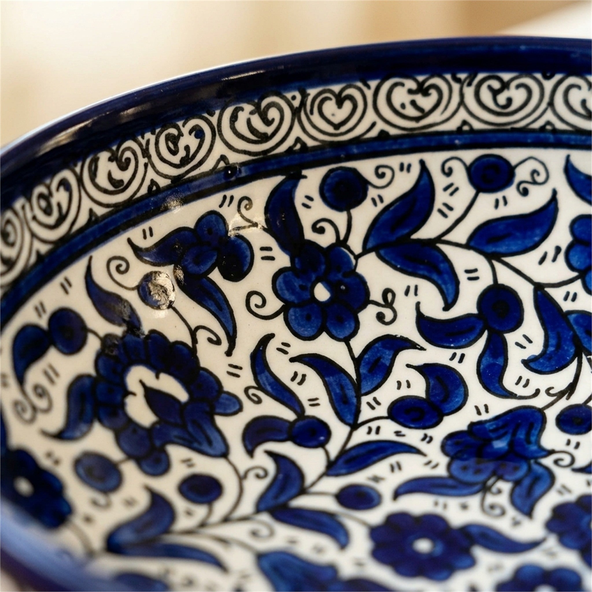 Round Ceramic Serving Bowl 9.45 Inch in Indigo, close-up of the hand-painted detail