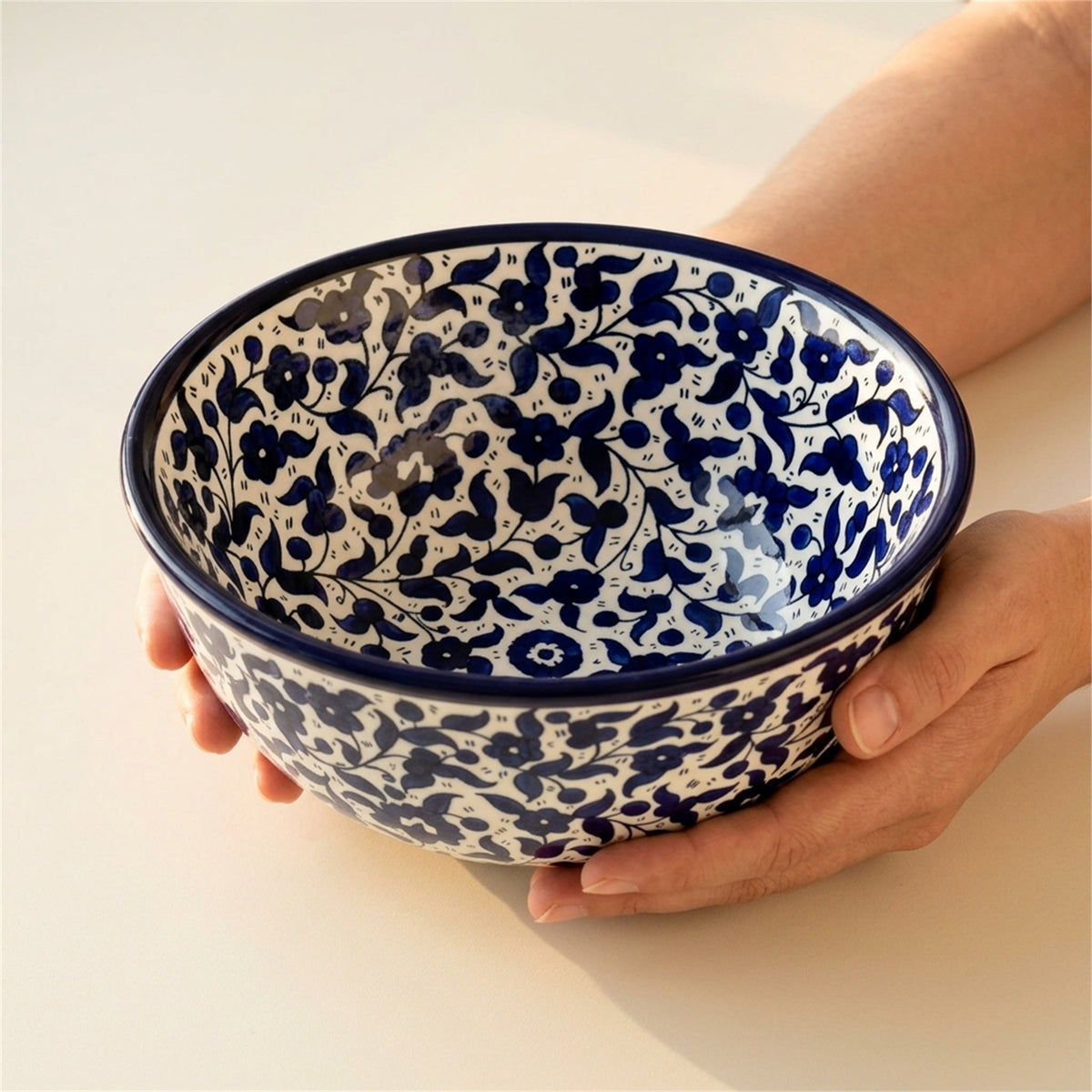Round Ceramic Serving Bowl 9.84 Inch in Indigo, held in hands to show scale